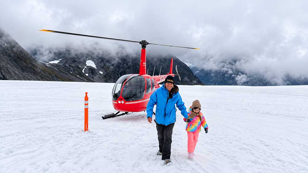Helicopter Ride Dog Sledding In Alaska