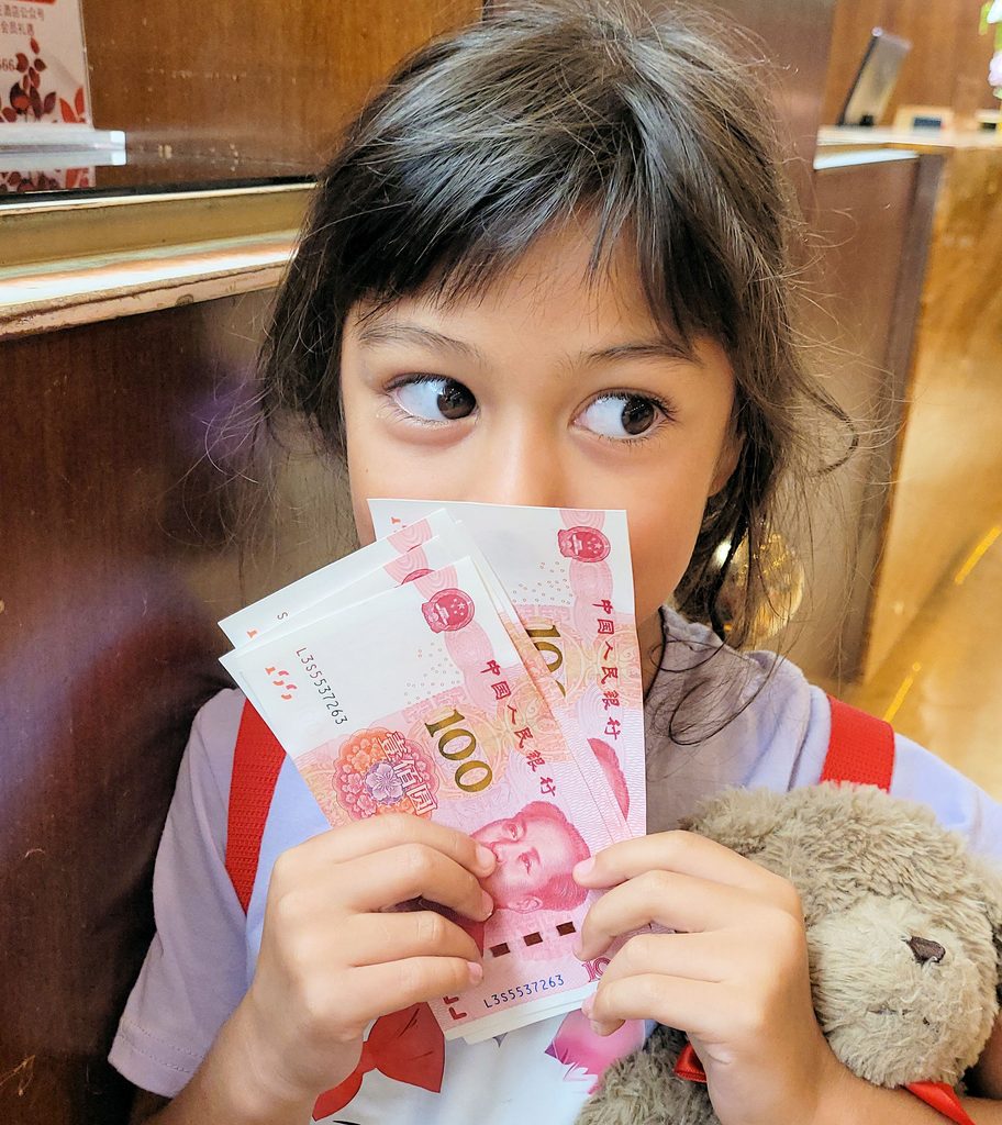 How To Pay In China As A Foreigner In 2026: Alipay, Wechat Pay, Cash &Amp; Cards Girl Holding Rmb Banknotes From Chinese Atm