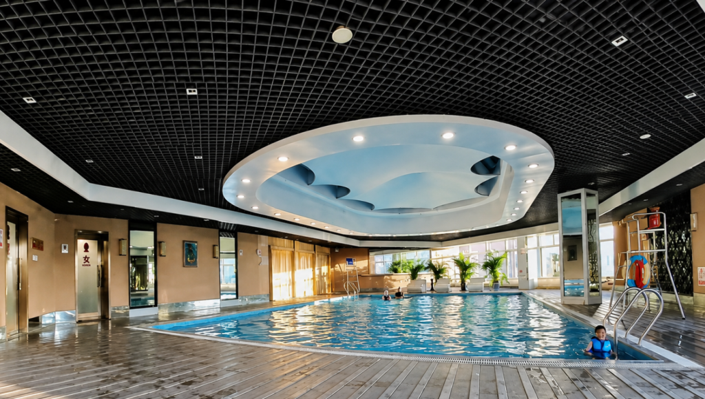 Hotel Pool With Child Swimming