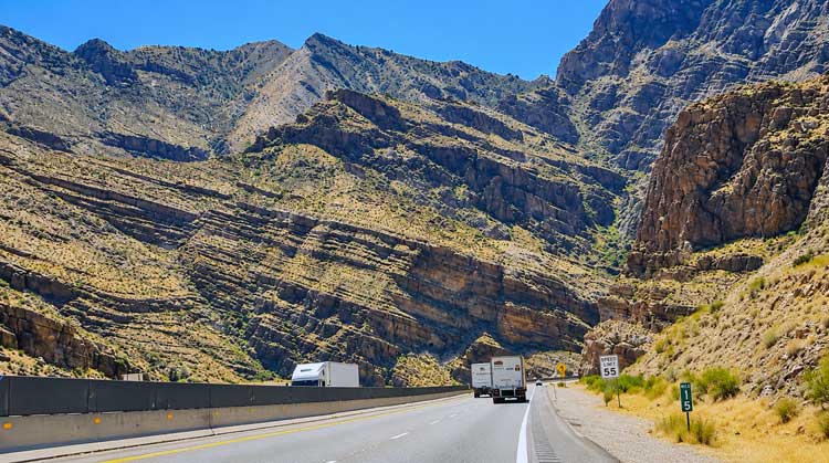 Virgin River Gorge Scenic Drive: I-15 Through Arizona Trucks On I-15 Between Steep Canyon Walls Near Mile Marker 15 In Arizona