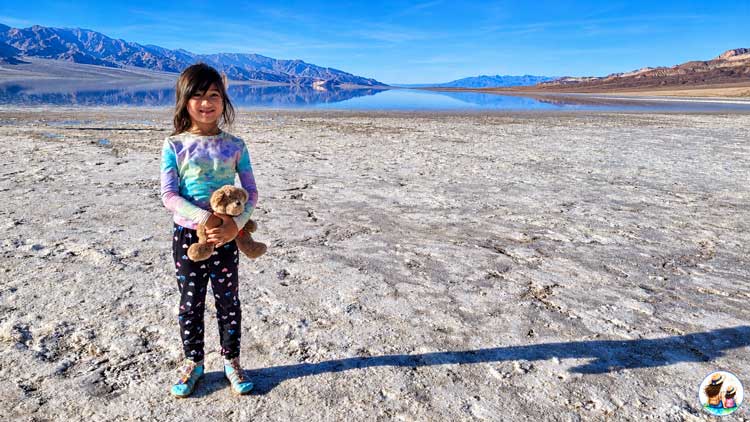 Death Valley With Kids: What Our 5-Year-Old Enjoyed Most White Salt Flats Stretching Toward The Mountains At Badwater Basin In Death Valley.