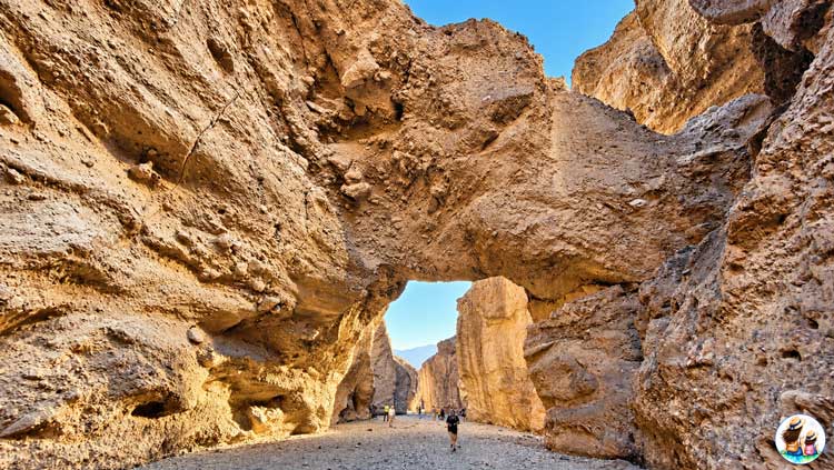 Death Valley With Kids: What Our 5-Year-Old Enjoyed Most Large Natural Rock Bridge Spanning A Rocky Canyon In Death Valley National Park.