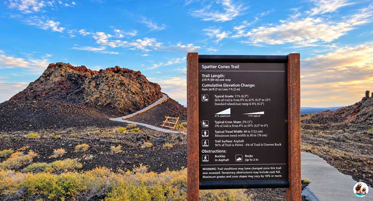 Craters Of The Moon National Monument: Things To Do And Visitor Guide Paved Spatter Cones Trail Winding Up A Volcanic Spatter Cone Beside The Trailhead Sign At Craters Of The Moon National Monument.