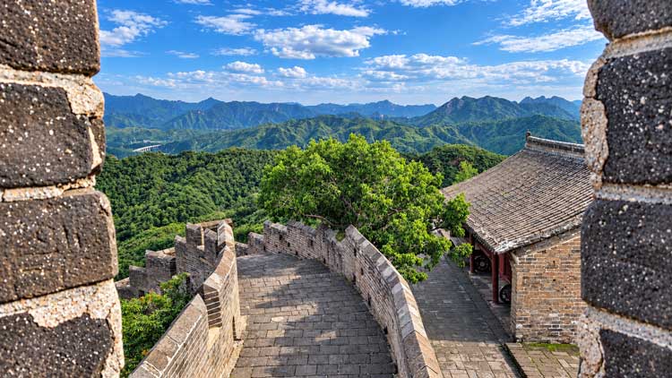 Jinshanling Great Wall Winding Across Mountain Ridges In China.